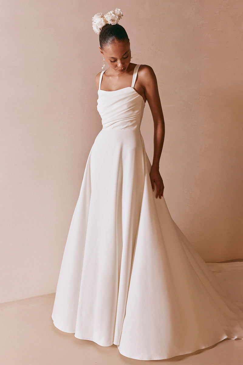 grace loves lace emme dress With Emma, you're not just getting a gownshe's a canvas for your bridal dreams. Straps on or off, hair up or down, and endless ways to make her uniquely yours