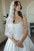 Bold lace mantilla veil
