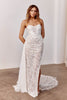 Woman wearing a strapless lace wedding dress with a split_XS_