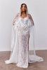 Woman wearing a lace wedding dress and veil_XS_
