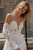 Woman in a lace wedding dress outdoors_XS_