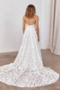 Woman wearing a lace wedding dress with a long train_XS_