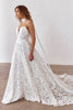 Woman wearing a strapless lace wedding dress and necktie_XS_