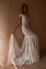 Model wearing the La Paz gown while holding train with fingerloop