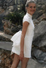 Woman in a short wedding dress outdoors_XS_