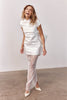 Woman wearing a short wedding dress and sheer skirt_XS_