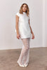 Woman wearing a short wedding dress and sheer skirt_XS_