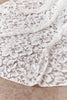 Close-up of Opaline's lace fabric.