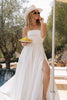 Woman in an A-Line wedding dress by a poolside_XS_