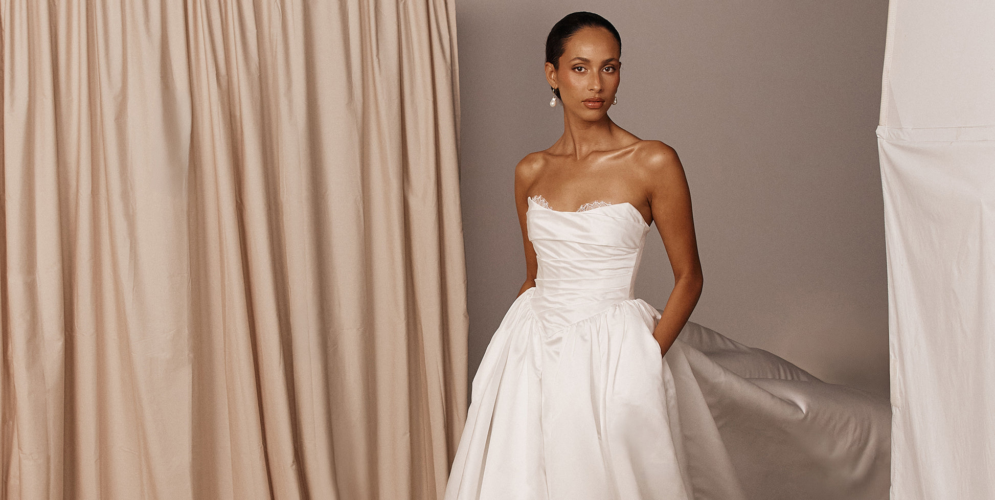 Woman in a strapless A-line wedding dress.