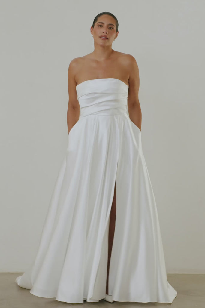 A satin strapless wedding dress.