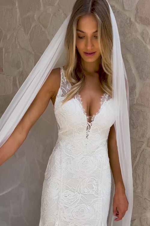 wedding dress under 500 Beautiful dresses $500? You're not dreaming  Check out gorgeous gowns at a great price-point (like these!) via the link: https://davidsbridal.visitlink.me/FtZMrR The backless feature enhances the gowns allure V Neck Floral Lace Wedding