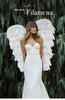 Filamena gown on model with white wings