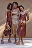 Bridesmaids in Grace Loves Lace Midi Dresses in Copper and Gold