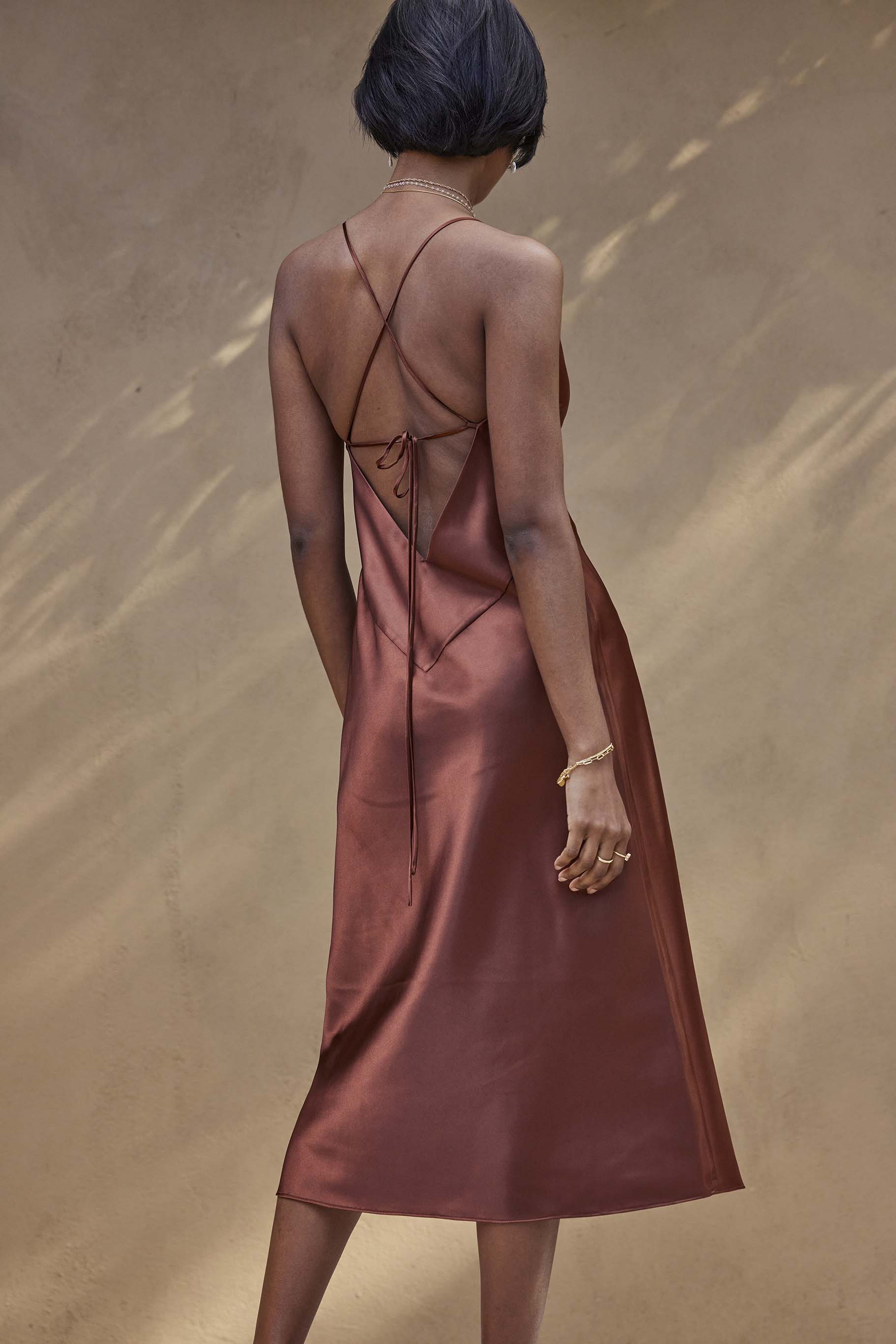 la lune backless midi dress copper As seen on @harmony.butcher in the latest La Lune Backless Midi Dress in Copper. Explore fresh shades in your favourite silhouette, online now #ShonaJoy